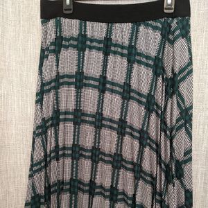 Ladies green, white, and black plaid skirt.